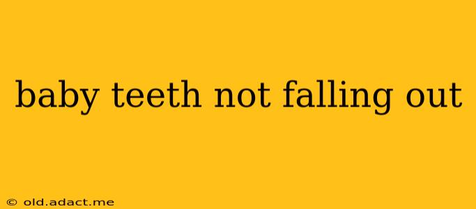 baby teeth not falling out