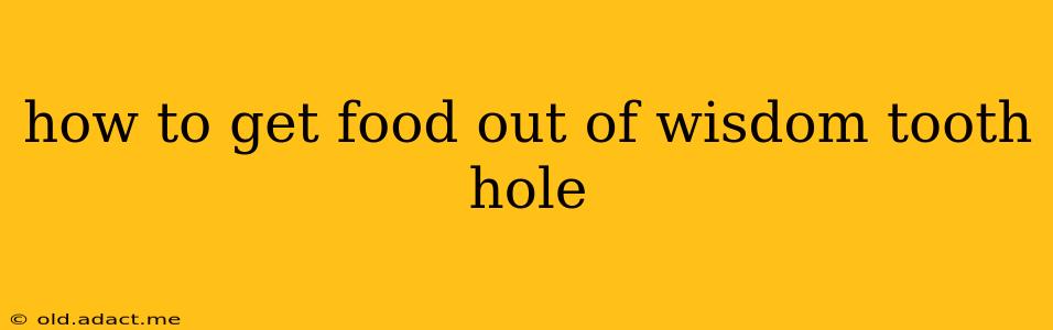 how to get food out of wisdom tooth hole