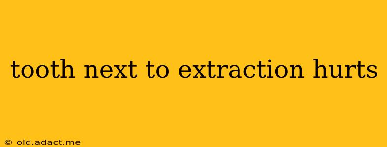 tooth next to extraction hurts
