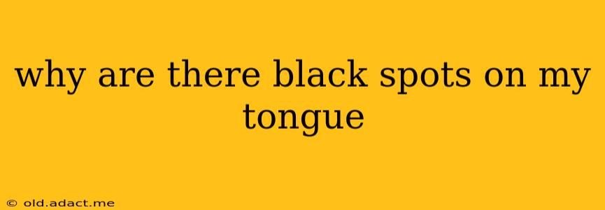 why are there black spots on my tongue