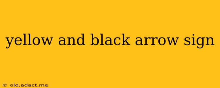 yellow and black arrow sign